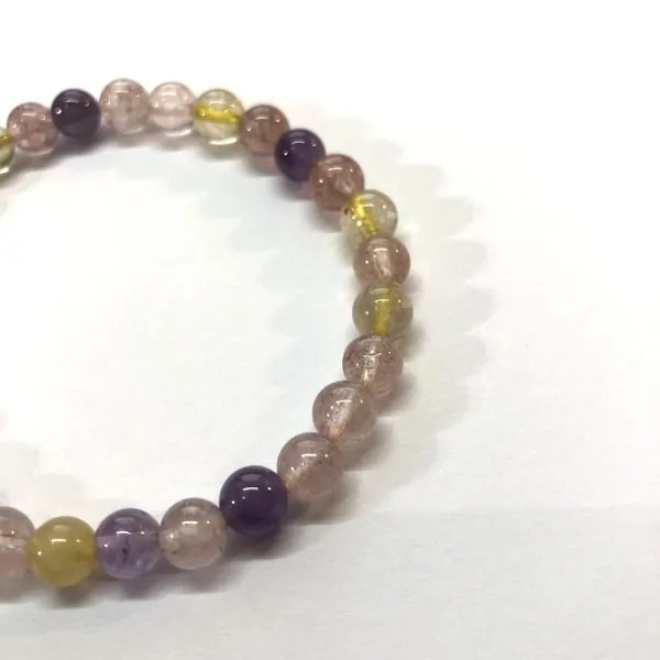 Bracelet Super Seven (auralite) perles rondes de 6mm| bracelets en pierres | Dans les yeux de Gaïa