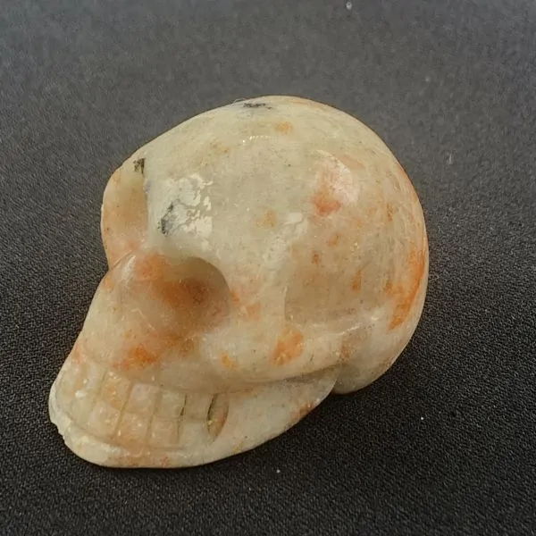Petit crâne en Pierre de Soleil Naturelle | Crânes de Cristal | Dans les yeux de Gaïa